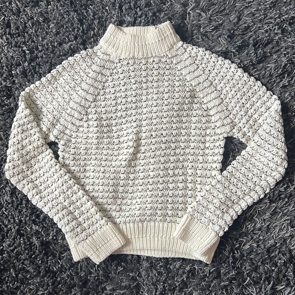 White and black knit sweater